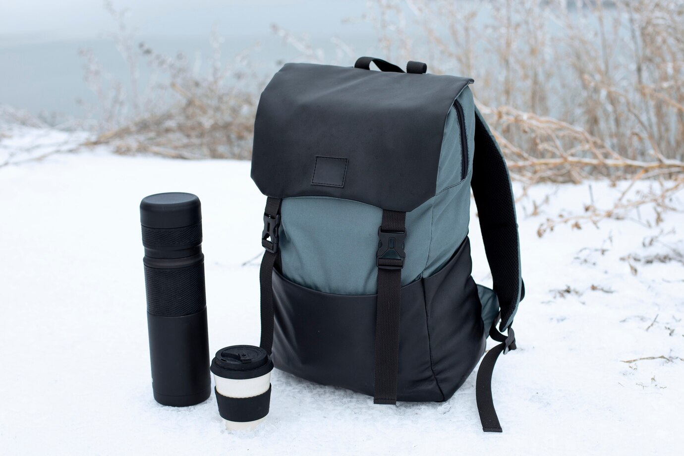 roadtrip-concept-with-backpack-flask_23-2149270128.jpg
